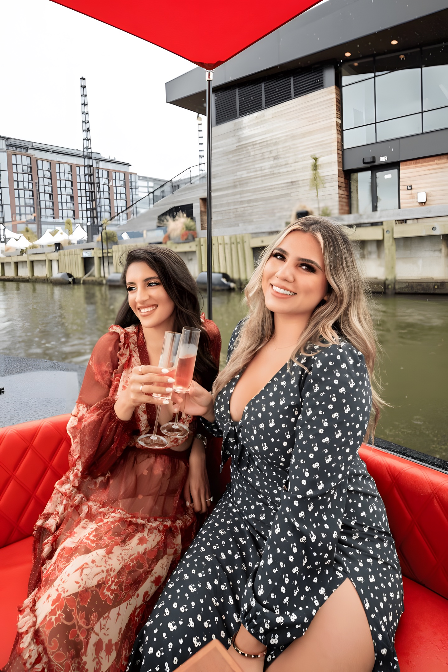 Friends toasting champagne aboard a Yachtsy cruise